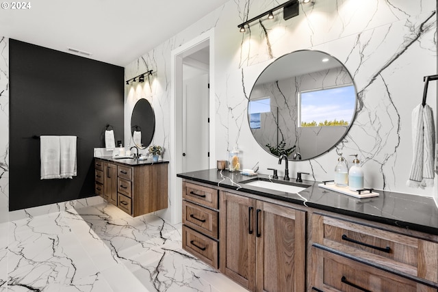 bathroom featuring double vanity