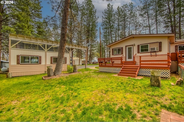 view of yard with a wooden deck