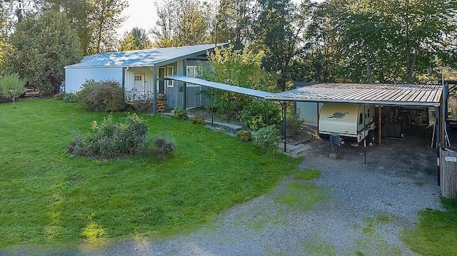 view of yard with a carport