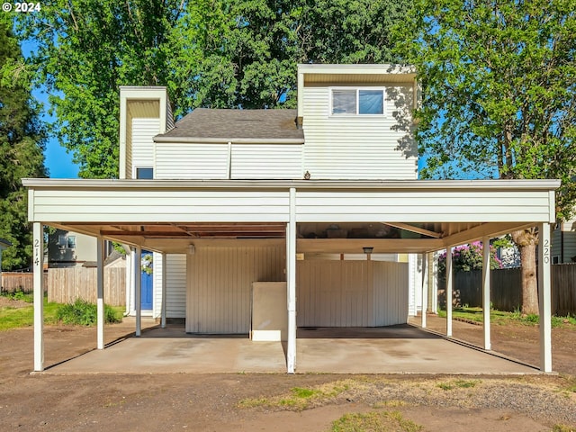 view of parking / parking lot with a carport