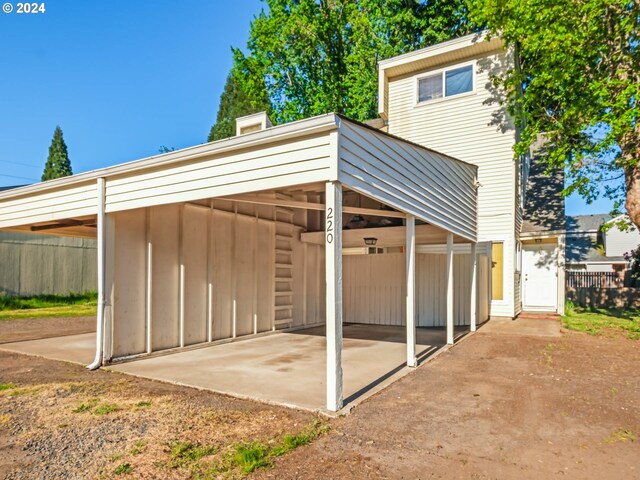 exterior space featuring a carport