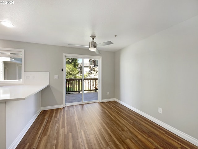 interior space with hardwood / wood-style floors and ceiling fan