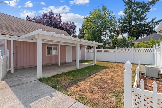 view of yard featuring central AC