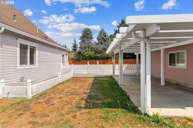 view of yard featuring a carport