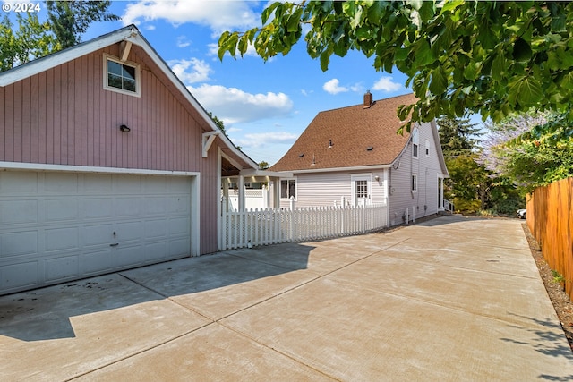 exterior space with a garage