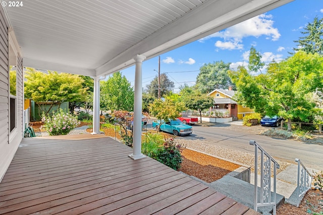 wooden deck featuring a porch