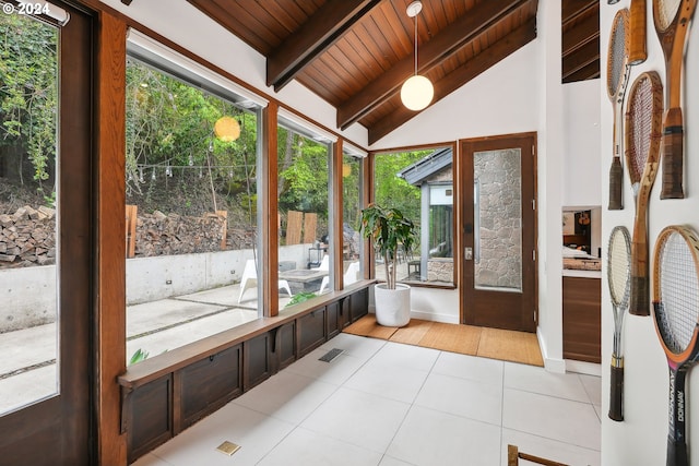 sunroom with vaulted ceiling with beams and wooden ceiling