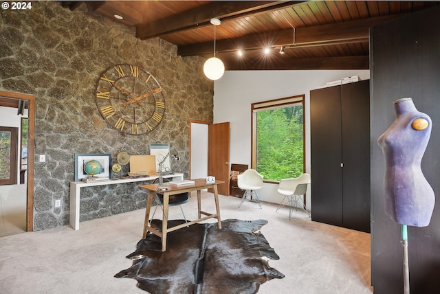 office space featuring carpet flooring, wooden ceiling, and vaulted ceiling with beams