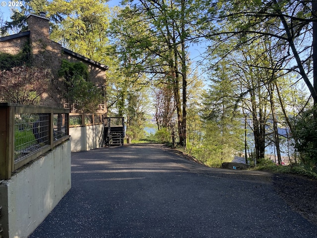 view of road featuring stairs