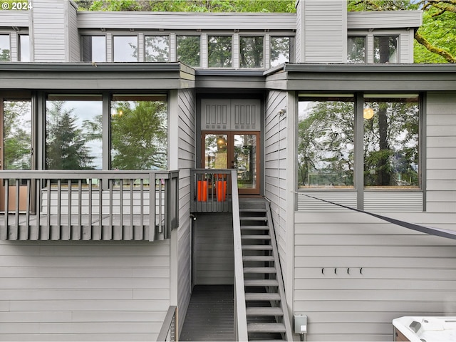 property entrance featuring french doors and a chimney