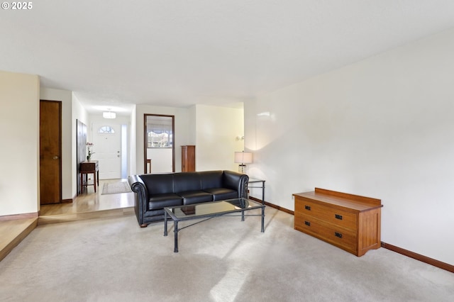 living room featuring light carpet