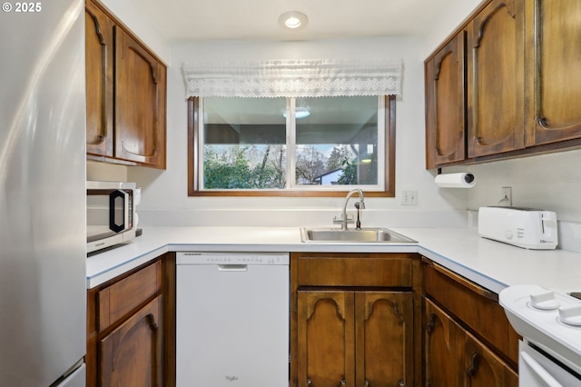 kitchen featuring stainless steel appliances and sink