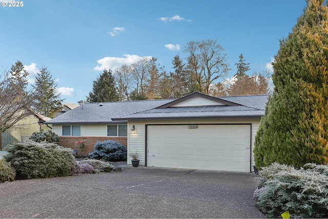 view of side of property featuring a garage