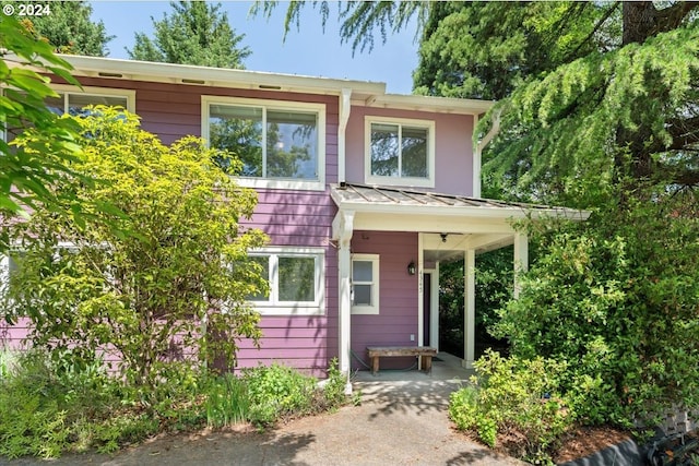 view of front of home featuring a patio