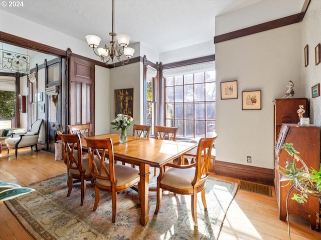1006 Pine St NE, Silverton, OR 97381 - dining space with light wood finished floors and plenty of natural light