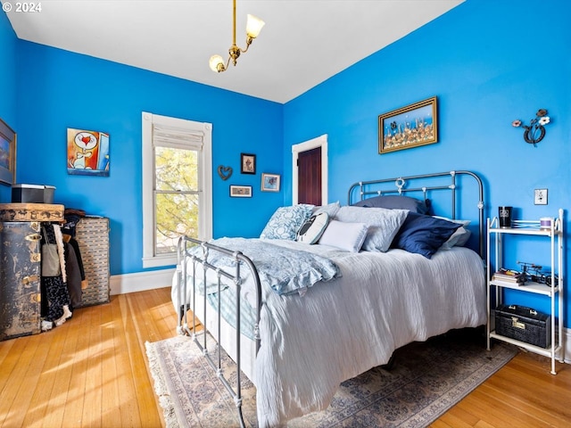 bedroom with hardwood / wood-style flooring