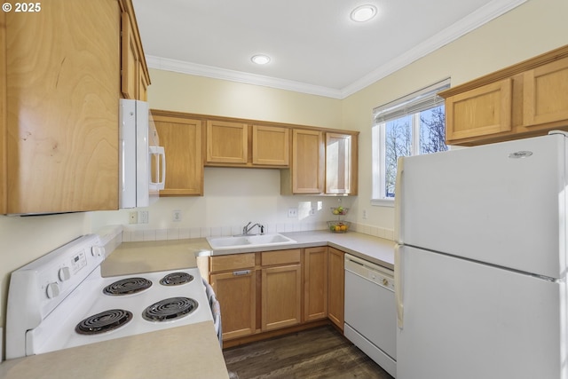 kitchen featuring white appliances, dark wood-type flooring, ornamental molding, and sink