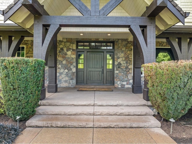 entrance to property featuring covered porch