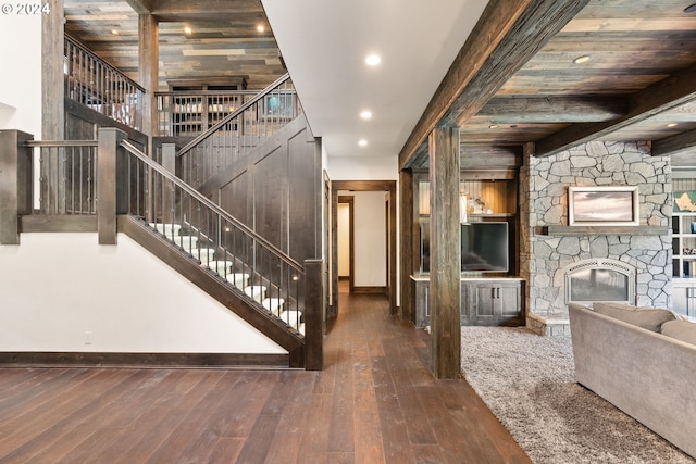 interior space featuring wood ceiling and dark hardwood / wood-style flooring