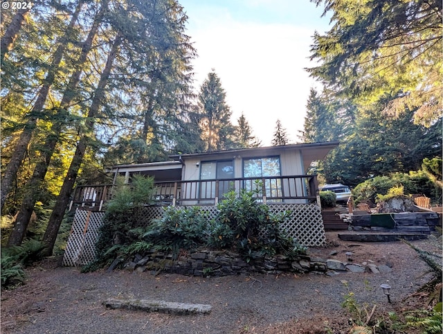 view of front of home with a deck