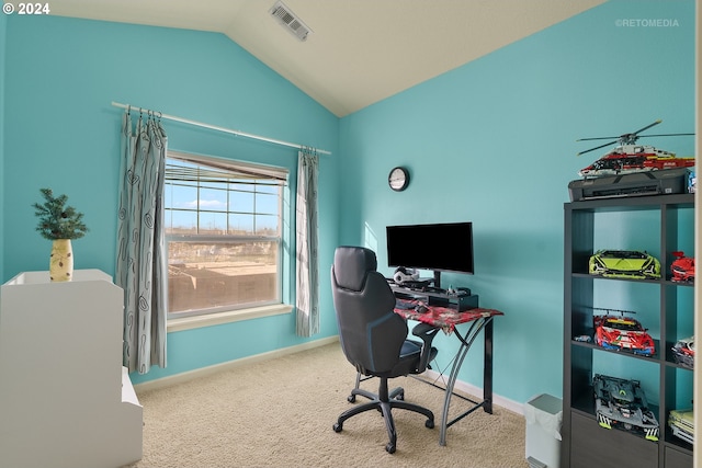 office area featuring carpet floors and vaulted ceiling