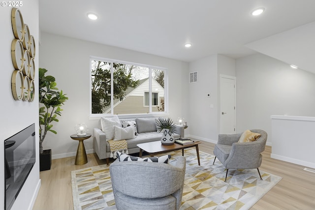 living room featuring light wood-type flooring