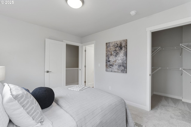 15063 SE Division St, Portland, OR 97236 - carpeted bedroom featuring a walk in closet and a closet