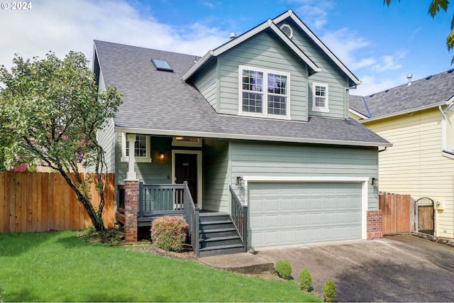 view of front facade with a front lawn and a garage