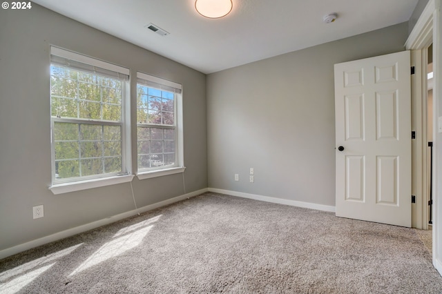 view of carpeted spare room