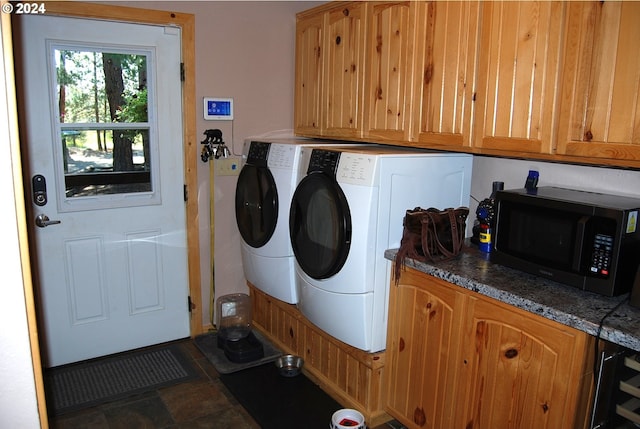 clothes washing area featuring washing machine and dryer