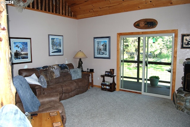 living room with lofted ceiling, wooden ceiling, and carpet