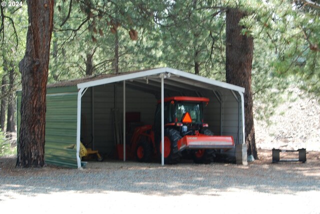 exterior space with a carport