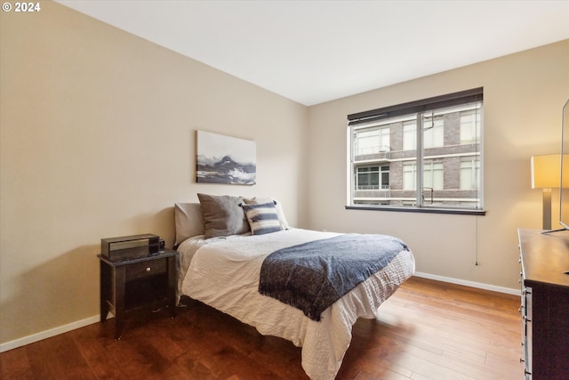 bedroom featuring hardwood / wood-style flooring