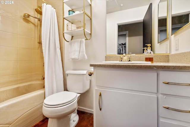 full bathroom featuring shower / bath combination with curtain, hardwood / wood-style flooring, vanity, and toilet