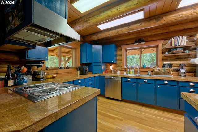 kitchen featuring log walls, stainless steel appliances, island range hood, wooden ceiling, and beam ceiling