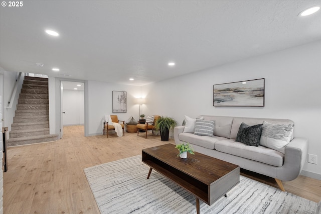 living room with light hardwood / wood-style floors