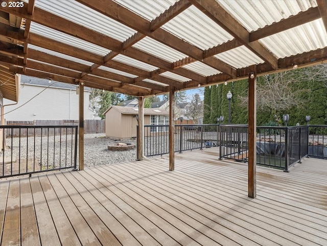 deck featuring a storage shed