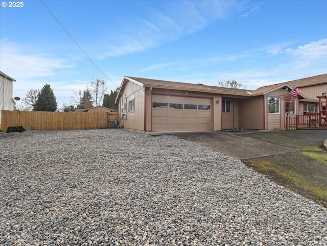 ranch-style home featuring a garage