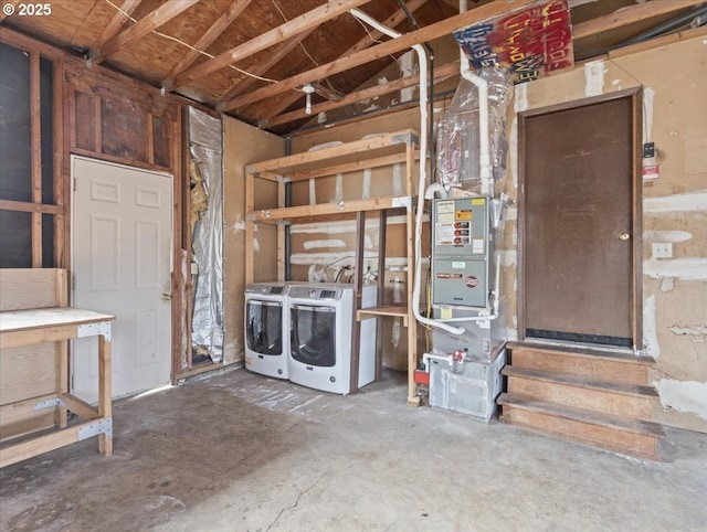 basement with washer and clothes dryer