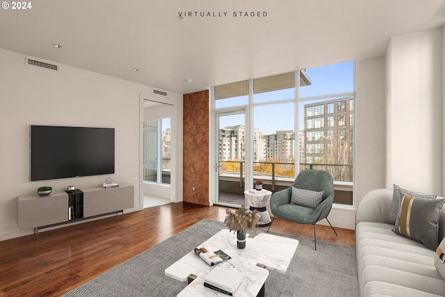 living room with hardwood / wood-style flooring