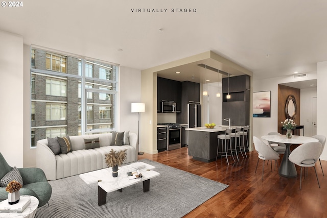 living room featuring dark wood-type flooring