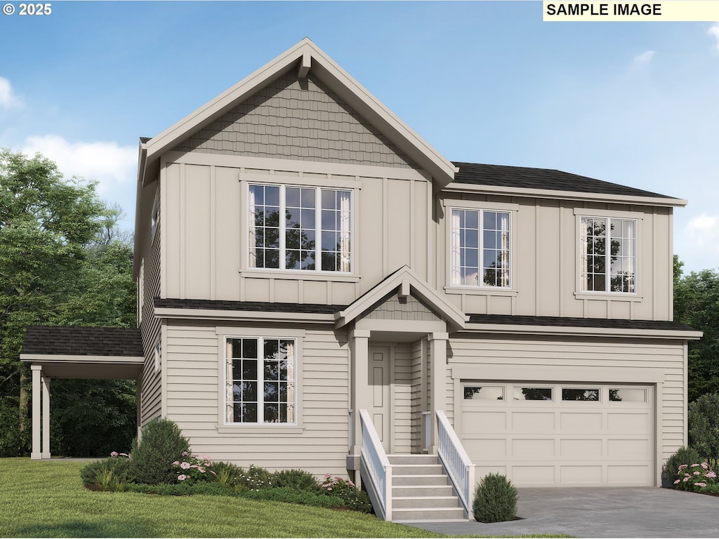 view of front of home featuring a front lawn, board and batten siding, concrete driveway, and a garage