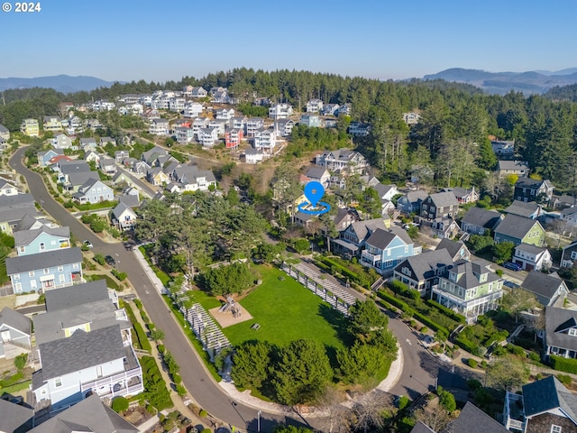 drone / aerial view featuring a mountain view