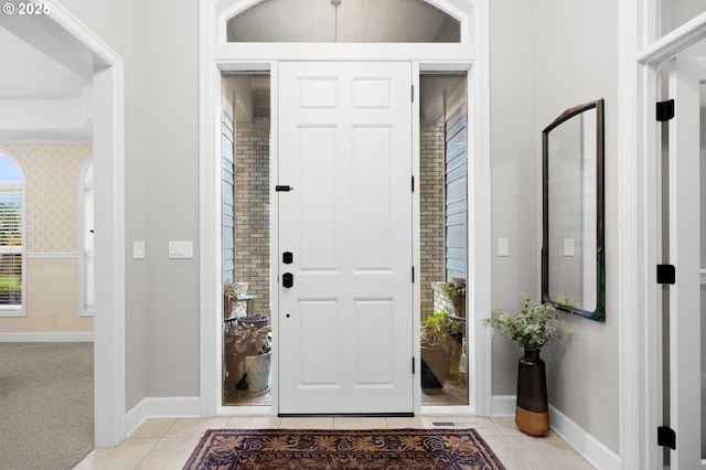 entrance foyer with light tile patterned floors