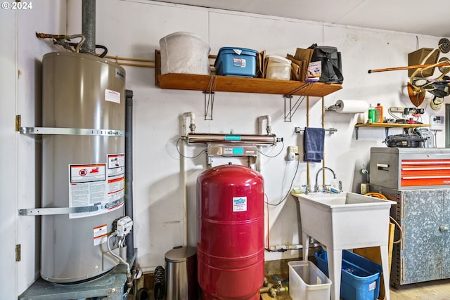 utility room featuring water heater