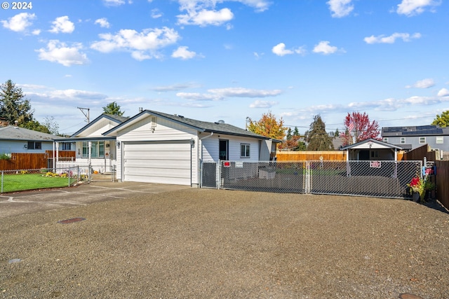 single story home featuring a garage