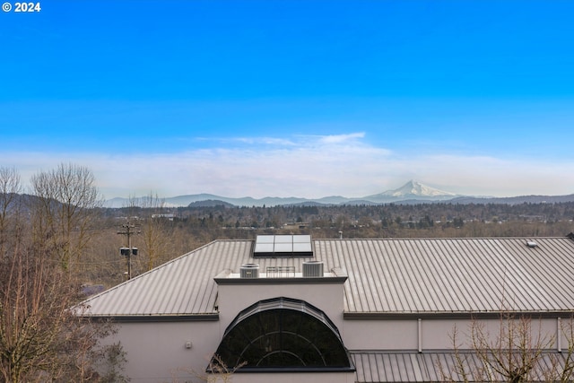 exterior space featuring a mountain view