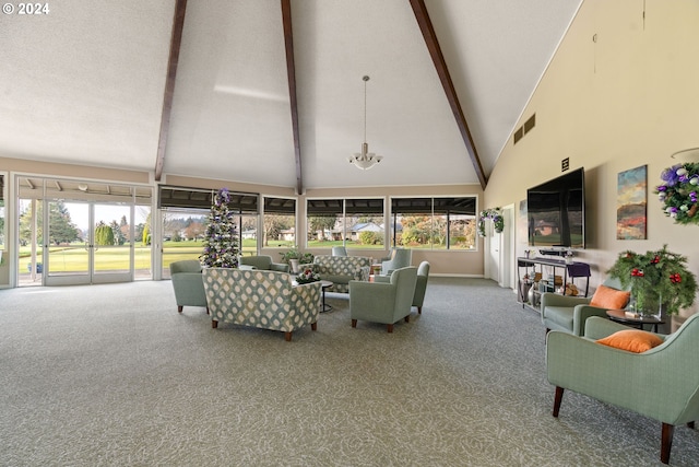 sunroom / solarium with vaulted ceiling with beams