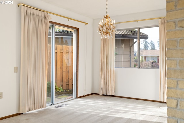 interior space featuring a chandelier