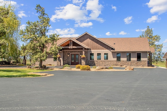 craftsman house featuring french doors